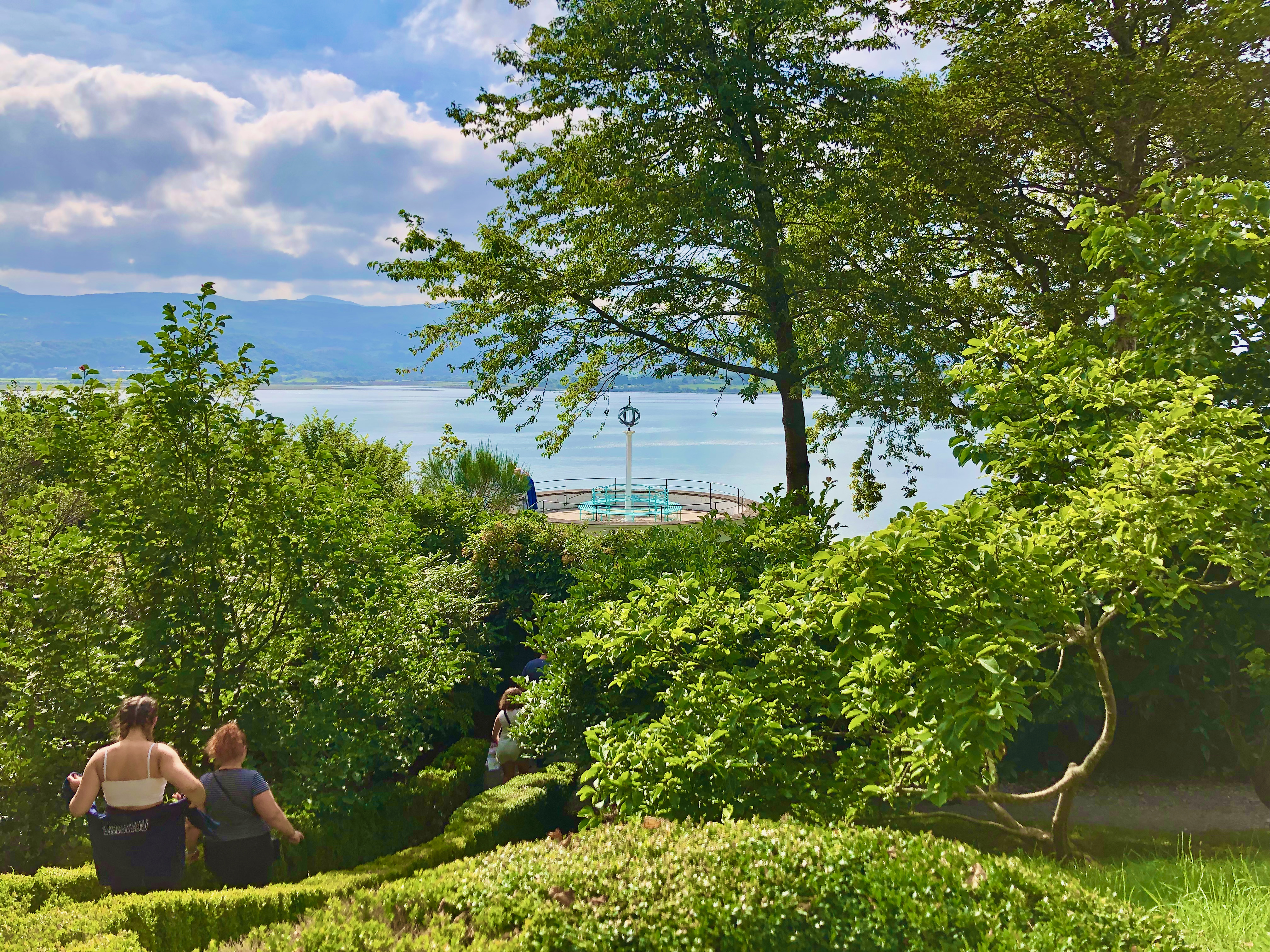 Top to bottom:
The ice cream buyer
An archway in the village
View of the sea from the gardens
